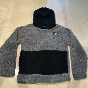New Balance All Terrain hoodie with front pocket.